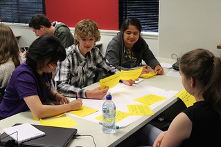Students writing down user stories as part of the BA and UX work. Photo by Kristina Hoeppner