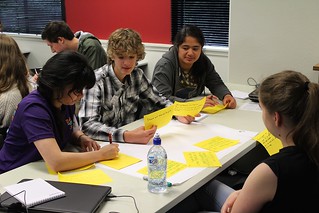 Students writing down user stories as part of the BA and UX work. Photo by Kristina Hoeppner
