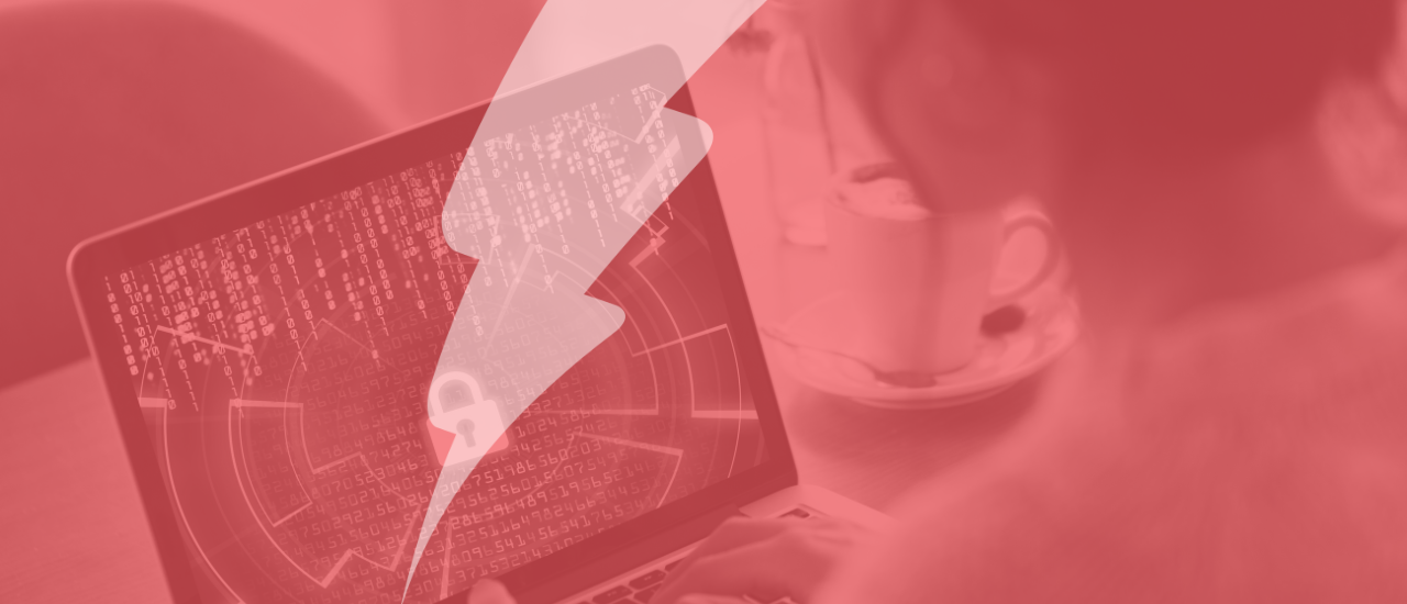 A stylised red-toned image showing a person using a laptop with a digital lock and data visualisation on screen, symbolising cybersecurity. A Catalyst lightning bolt overlays the image, reinforcing the theme of secure and empowered online learning environments. A coffee cup sits in the background.