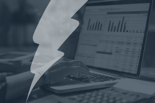 Stylised image with a blue overlay and Catalyst lightning bolt motif. A person is working on a laptop displaying data dashboards with bar charts and tables, representing analytics or assessment tracking in Moodle. The image relates to smarter ways of managing assessment.